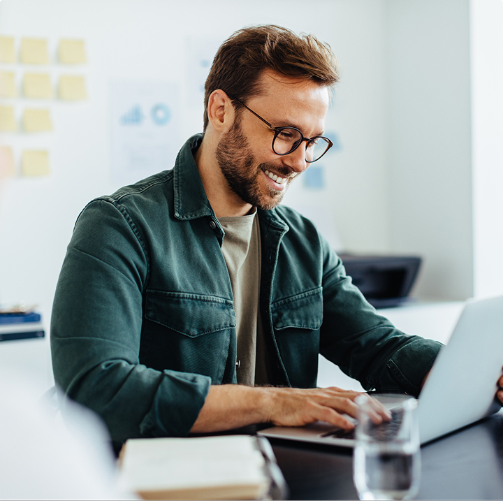 Person Working on Laptop